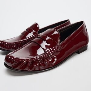 Zara Burgundy Faux Patent Leather Penny Loafers.
